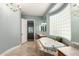 Bright main bathroom featuring a large soaking tub, stylish lighting, and a serene atmosphere at 2467 E Page Ave, Gilbert, AZ 85234