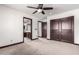 Bedroom featuring carpet floors and a modern ceiling fan at 2873 E Nolan Pl, Chandler, AZ 85249