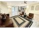 Inviting living room with stylish furniture and an open layout connecting to the kitchen at 29810 W Bellview St, Buckeye, AZ 85396