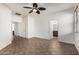 Spacious bedroom with tile floors, neutral walls, and multiple doorways at 29997 N 70Th Dr, Peoria, AZ 85383