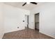 Bedroom showcasing a ceiling fan and access to a closet and the bathroom at 29997 N 70Th Dr, Peoria, AZ 85383