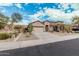 Attractive house with a xeriscaped yard, a two-car garage, and a well-maintained exterior at 29997 N 70Th Dr, Peoria, AZ 85383