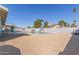 Large backyard featuring an in-ground pool with a slide and a diving board at 3102 W Desert Cove Ave, Phoenix, AZ 85029