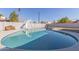 Inviting in-ground pool with slide and diving board, perfect for enjoying warm weather at 3102 W Desert Cove Ave, Phoenix, AZ 85029