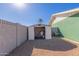 Storage shed alongside the house, nestled on gravel at 3102 W Desert Cove Ave, Phoenix, AZ 85029