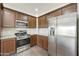 Stylish kitchen with stainless steel refrigerator and matching appliances at 33575 N Dove Lakes Dr # 2036, Cave Creek, AZ 85331