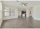 Open concept living room showcasing ceramic tile floors and natural light at 33575 N Dove Lakes Dr # 2036, Cave Creek, AZ 85331