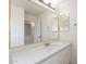 Bathroom featuring quartz countertop, a single sink vanity, and framed vanity mirror at 35030 N Barzona Trl, San Tan Valley, AZ 85143