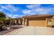 Charming home with a well-maintained yard, desert landscaping, and a two-car garage at 3768 N 162Nd Ln, Goodyear, AZ 85395