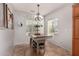 Cozy dining nook with modern chandelier, and decorative accents at 41260 N Salix Dr, San Tan Valley, AZ 85140