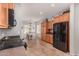 Bright kitchen with stainless steel appliances, tile flooring, and ample cabinet space at 41260 N Salix Dr, San Tan Valley, AZ 85140