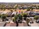 Aerial view of a house with solar panels in a suburban neighborhood at 4189 E Sandy Way, Gilbert, AZ 85297