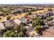 Aerial view of a neighborhood featuring a home with solar panels on the roof at 4189 E Sandy Way, Gilbert, AZ 85297