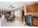 Dining area adjacent to kitchen with dining table, chairs, and desk space at 4189 E Sandy Way, Gilbert, AZ 85297