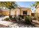 Attractive single-Gathering home featuring a desert landscape, covered porch, and a two-car garage at 4189 E Sandy Way, Gilbert, AZ 85297