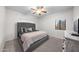 Cozy bedroom offering natural light, a comfortable bed, and ample space for relaxation at 45 E 9Th Pl # 12, Mesa, AZ 85201