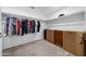 Walk-in closet with ample hanging space and additional storage, ready for organization at 45 E 9Th Pl # 12, Mesa, AZ 85201