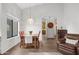 Cozy dining area featuring tile floors, a pendant light, and seating for four at 45 E 9Th Pl # 12, Mesa, AZ 85201