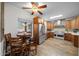 Well-lit eat-in kitchen featuring stainless steel appliances and custom wood cabinets at 45 E 9Th Pl # 12, Mesa, AZ 85201