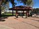 View of the outdoor covered picnic tables with built-in grills for community residents at 455 S Delaware Dr # 171, Apache Junction, AZ 85120