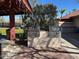 Outdoor grilling stations with dual stainless steel grills and a hot tub in the background at 455 S Delaware Dr # 171, Apache Junction, AZ 85120