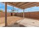 View of the backyard featuring a covered patio, brick walls, and ample space at 4601 S 21St St, Phoenix, AZ 85040