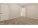 Neutral bedroom showing carpet, paint, baseboards, and closet doors at 4601 S 21St St, Phoenix, AZ 85040