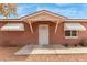 Up close view of the front entry of the charming single-story home at 4601 S 21St St, Phoenix, AZ 85040