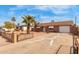 Charming single-story home with well-maintained desert landscaping and a brick fence at 4601 S 21St St, Phoenix, AZ 85040