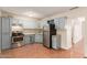 Charming kitchen with stainless steel appliances and light blue cabinetry at 4601 S 21St St, Phoenix, AZ 85040