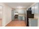 This kitchen features stainless steel appliances and light blue cabinetry at 4601 S 21St St, Phoenix, AZ 85040