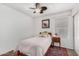 Inviting bedroom featuring a window with flowers at 474 W Smoke Tree Rd, Gilbert, AZ 85233