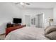 Bright bedroom featuring a large window and neutral tones at 474 W Smoke Tree Rd, Gilbert, AZ 85233