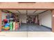 Spacious garage with ample storage and well-organized space, perfect for parking and hobbies at 474 W Smoke Tree Rd, Gilbert, AZ 85233