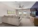 Cozy living room with comfortable seating, natural light, and a view of the neighborhood at 5513 S Coyote Cyn, Mesa, AZ 85212