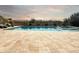 Inviting pool with a tiled patio, surrounded by desert landscaping, offering a relaxing retreat for enjoying warm Arizona days at 6039 E Sienna Bouquet Pl, Cave Creek, AZ 85331