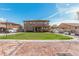 Lush green backyard with well-maintained lawn and mature trees, perfect for outdoor enjoyment at 6208 N 78Th Dr, Glendale, AZ 85303