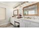 Bright bathroom featuring and vanities and modern lighting at 6208 N 78Th Dr, Glendale, AZ 85303