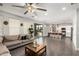 Open-concept living room featuring a spacious layout connecting to the kitchen at 6208 N 78Th Dr, Glendale, AZ 85303