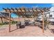 Outdoor kitchen and pergola with brick patio, grill, and adjacent RV parking create ideal entertainment space at 6208 N 78Th Dr, Glendale, AZ 85303