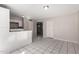 Open-concept living room featuring tile flooring and neutral color scheme at 658 S Sycamore St # Value, Mesa, AZ 85202