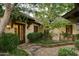 Charming front yard with a stone path and lush landscaping at 6737 E Taza Way, Paradise Valley, AZ 85253