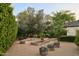 A charming vegetable garden with raised beds, mature trees, and ample space for growing at 6737 E Taza Way, Paradise Valley, AZ 85253