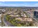 Aerial view showcasing the unique architecture and landscaping of the apartment complex at 7151 E Rancho Vista Dr # 2007, Scottsdale, AZ 85251