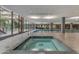 Indoor pool area with hot tub, providing a relaxing experience year-round at 7151 E Rancho Vista Dr # 2007, Scottsdale, AZ 85251