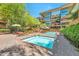 This multi-story community has a pool, spa, lounge chairs, and manicured landscaping at 7151 E Rancho Vista Dr # 2007, Scottsdale, AZ 85251