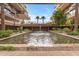 Beautiful courtyard water feature with lush landscaping and modern architecture at 7151 E Rancho Vista Dr # 2007, Scottsdale, AZ 85251