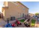 Large backyard with pavers, artificial turf and play area, great for outdoor entertaining and play at 7611 S 15Th St, Phoenix, AZ 85042