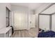 Bedroom view showing closet, doorway, ceiling fan, and luxury vinyl flooring at 7611 S 15Th St, Phoenix, AZ 85042