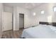 Bedroom view showing closet and doorway with luxury vinyl plank flooring at 7611 S 15Th St, Phoenix, AZ 85042